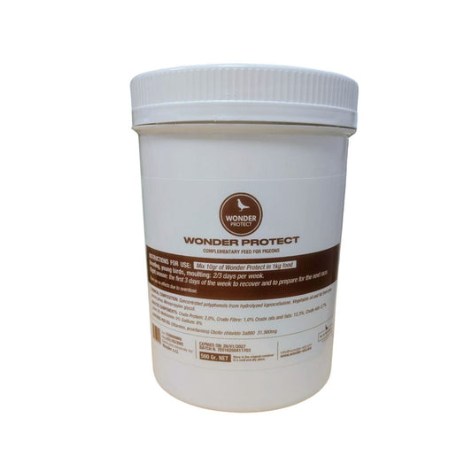 Weiße Dose Wonder Protect – Ergänzungsfuttermittel für Tauben, mit braunem Etikett und Dosierempfehlung (10 g pro kg Futter), Inhalt: 500 g.